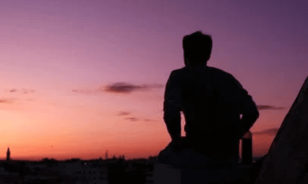 a guy staring at horizon