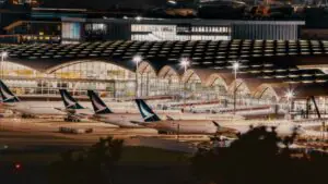 cathay pacific aeroplanes at hong kong airport hangar night view
