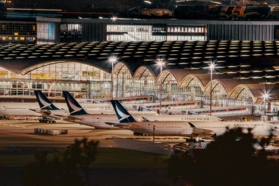 cathay pacific aeroplanes at hong kong airport hangar night view